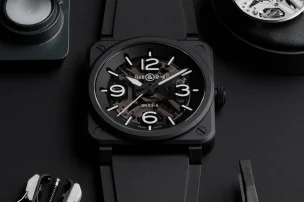 The Bell and Ross BR-03 Skeleton Black Ceramic next to its movement and manufacturing tools