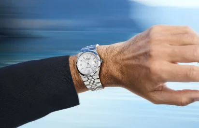 rolex-new-watches-2025-land-dweller-lifestyle-shot-roger-federer-wristshot