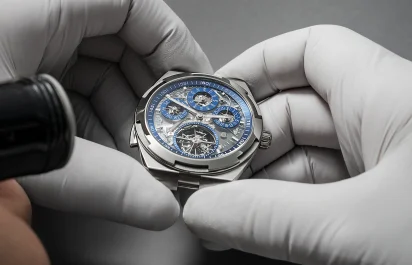 The Vacheron Constantin Overseas Grand Complication Openface Ref. 6510V/110T-128C in the hands of a watchmaker