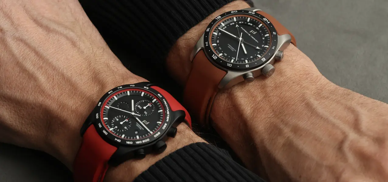 Die Porsche Design Custom Built Timepieces Chronograph und Globetimer am Handgelenk.