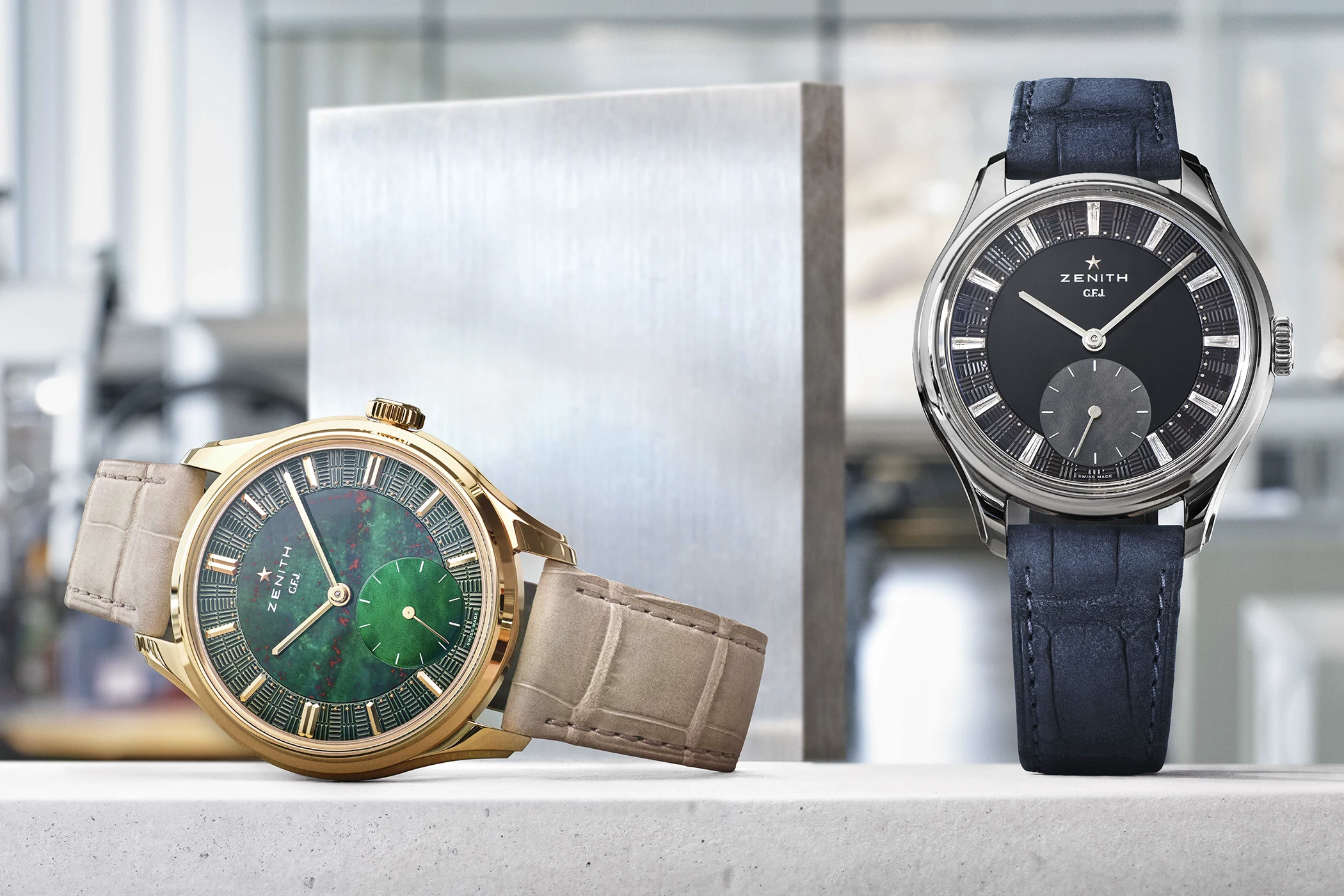 Die Frontansicht der Zenith G.F.J. in Gelbgold mit Blutstein sowie in Tantal mit Onyx.